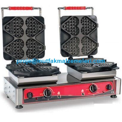 İki hazneli, kalp desenli döküm pişirme yüzeyine sahip paslanmaz çelik gövdeli çiftli waffle makinesi. Çıkarılabilir plakaları ve ergonomik kumanda paneli ile profesyonel kullanım için tasarlanmış endüstriyel waffle pişirme makinesi.