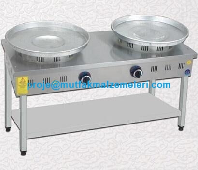 120x50x85 cm boyutlarında, 28 kg ağırlığında, iki pişirme gözlü profesyonel paslanmaz tantuni ocağı. CE belgeli, 13,70 kW ısıtma kapasiteli, ergonomik tasarımlı, LPG ve NG dönüşümlü sanayi tipi tantuni pişirme ve satış tezgahı modeli.