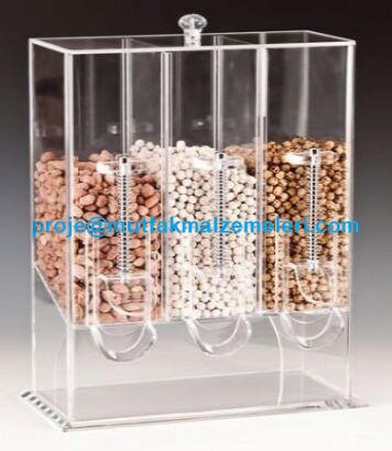1.sınıf dayanıklı malzemeden 15x32 cm taban alanı ve 43 cm endüstriyel yükseklikle üretilen kuruyemiş teşhir ve servis dispenseri, dikey mimarisiyle yerden tasarruf sağlar.