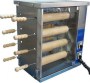 Elektrikli makara tatlı makinaları tüplü makara tatlısı pişirme makinelerinden elektrikle çalışan bu makara tatlısı pişirme makinasının 8 ayrı ahşap merdanesi olup 50x35x62 cm ölçüsündedir