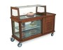 AOR-302 MS soğutmalı pasta teşhir arabası; 55x140x112 cm, ahşap mobilyalı, LED aydınlatmalı, dijital termostatlı ve motorlu soğutma sistemli profesyonel pasta servis arabası. İkisi frenli 4 tekerlekli ve çift katlı ısı camlı alt bölmeli model.